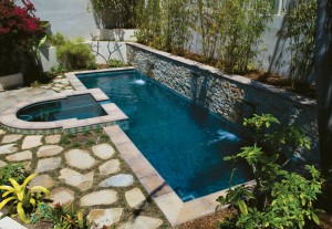 rectangle pool with elevated overflow spa